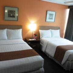Отель Makati Crown Regency Hotel Филиппины, Макати - отзывы, цены и фото номеров - забронировать отель Makati Crown Regency Hotel онлайн комната для гостей