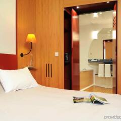 Отель Novotel Suites München Parkstadt Schwabing Германия, Мюнхен - 9 отзывов об отеле, цены и фото номеров - забронировать отель Novotel Suites München Parkstadt Schwabing онлайн комната для гостей фото 2