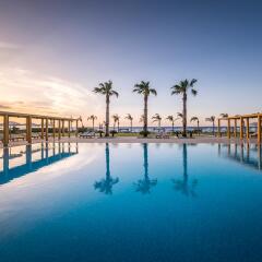 Отель Mitsis Alila Exclusive Resort and Spa бассейн фото 3