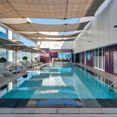 Отель The Act Hotel ОАЭ, Шарджа - 1 отзыв об отеле, цены и фото номеров - забронировать отель The Act Hotel онлайн бассейн фото 2