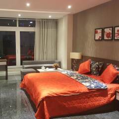 Апартаменты Sunny Serviced Apartment комната для гостей