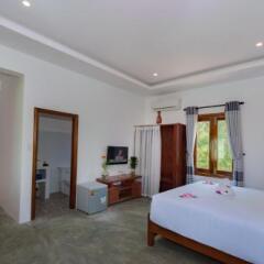 Отель An Bang Garden Homestay 3* Номер Делюкс с различными типами кроватей фото 6