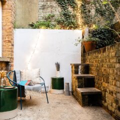 Отель The Kensington Grove - Stylish 2bdr Flat With Private Patio Лондон фото 2