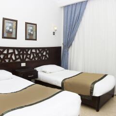 Апартаменты Pyramisa Sunset Pearl Apartments комната для гостей