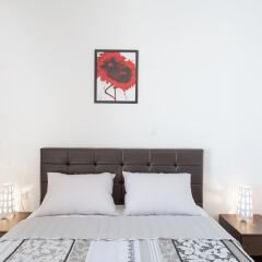 Отель Anesis Luxury Apartment Греция, Афины - отзывы, цены и фото номеров - забронировать отель Anesis Luxury Apartment онлайн комната для гостей фото 2