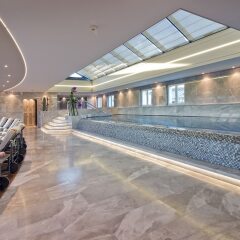 Отель Four Seasons Hotel Geneva Швейцария, Женева - отзывы, цены и фото номеров - забронировать отель Four Seasons Hotel Geneva онлайн спортивное сооружение