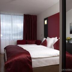 Отель Ramada Encore Geneva Швейцария, Ланси - 1 отзыв об отеле, цены и фото номеров - забронировать отель Ramada Encore Geneva онлайн комната для гостей фото 3