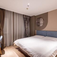 Отель Home Inn (Jiujiang Xunyang Road Pedestrian Street Branch) комната для гостей