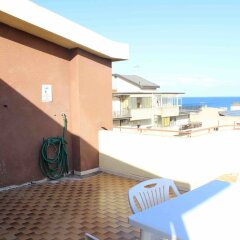 Отель Appartamento Vista Mare 5 Piano Бовалино-Марина балкон