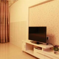 Апартаменты Xingfu Huafu Apartment комната для гостей фото 4