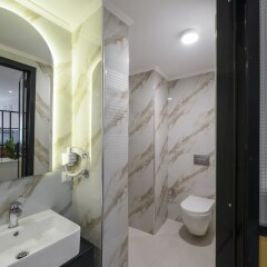 Отель Athenian Sensations Apartments & Suites Греция, Афины - отзывы, цены и фото номеров - забронировать отель Athenian Sensations Apartments & Suites онлайн ванная фото 2