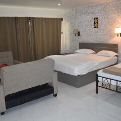 Апартаменты Galaxy Hotels & Apartments сейф в номере