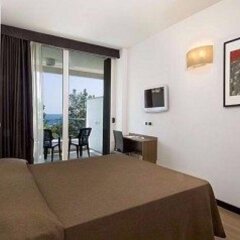 Отель Cristallo Италия, Римини - отзывы, цены и фото номеров - забронировать отель Cristallo онлайн комната для гостей фото 3