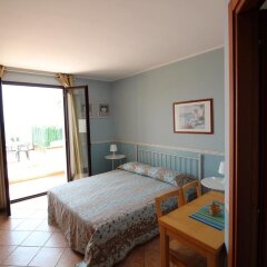Отель Residence Del Prado Рива-Лигуре комната для гостей
