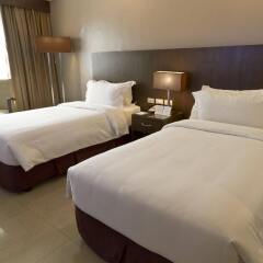 Mandarin Plaza Hotel комната для гостей фото 2
