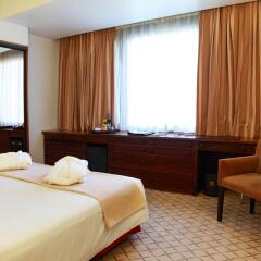 Dom Carlos Liberty Hotel комната для гостей