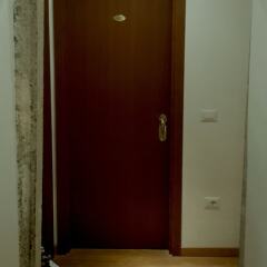 Отель San Lio Tourist House сейф в номере