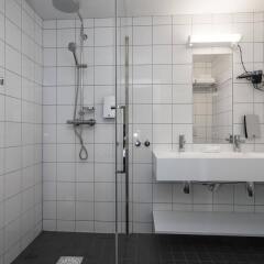 Отель Thon Hotel Nidaros Норвегия, Тронхейм - отзывы, цены и фото номеров - забронировать отель Thon Hotel Nidaros онлайн ванная