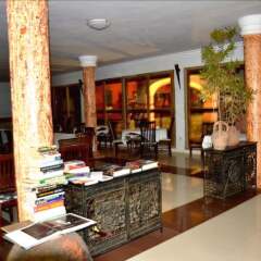 Апартаменты Accra Royal Castle Apartments & Suites Тема гостиничный бар