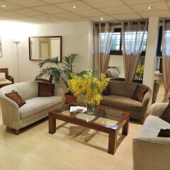Отель Residhotel Les Coralynes Франция, Канны - 9 отзывов об отеле, цены и фото номеров - забронировать отель Residhotel Les Coralynes онлайн интерьер отеля фото 3