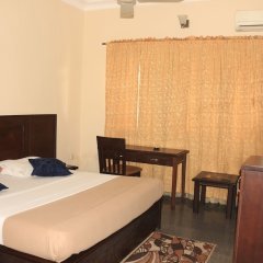 Отель Liz Ani Hotel Annex Нигерия, Калабар - отзывы, цены и фото номеров - забронировать отель Liz Ani Hotel Annex онлайн комната для гостей