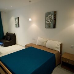 Отель Harbour Lodge сейф в номере