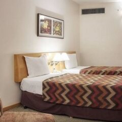 Bourbon Alphaville Business Hotel комната для гостей фото 3