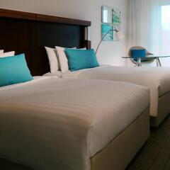 Отель Courtyard by Marriott Cologne Кёльн комната для гостей фото 3