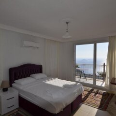 Villa MNM Турция, Калкан - отзывы, цены и фото номеров - забронировать отель Villa MNM онлайн комната для гостей фото 3