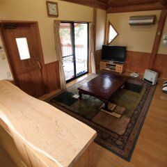 Отель Kurokawa Mori no Cottage Япония, Минамиогуни - отзывы, цены и фото номеров - забронировать отель Kurokawa Mori no Cottage онлайн комната для гостей фото 4