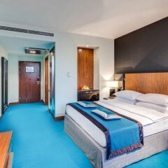 Гостиница Radisson Blu Belorusskaya в Москве - забронировать гостиницу Radisson Blu Belorusskaya, цены и фото номеров Москва комната для гостей фото 4
