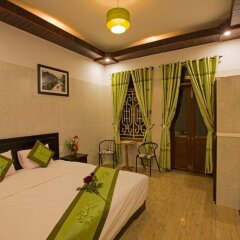 Отель The Village Homestay Хойан комната для гостей фото 4