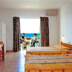 Отель Sofia Mythos Beach Aparthotel Греция, Милопотамос - 1 отзыв об отеле, цены и фото номеров - забронировать отель Sofia Mythos Beach Aparthotel онлайн комната для гостей фото 2