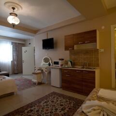 Отель Safran Suites Apart в номере фото 2