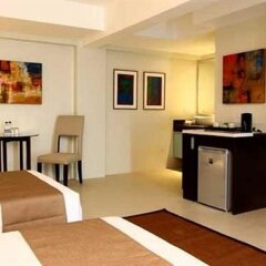 Отель Palm Rock Residences Филиппины, Макати - отзывы, цены и фото номеров - забронировать отель Palm Rock Residences онлайн удобства в номере