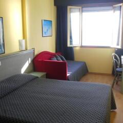 Hotel Le Rocce Del Capo Оспедалетти комната для гостей