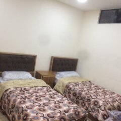 Отель Jasmine leaves furnished apartments Иордания, Амман - отзывы, цены и фото номеров - забронировать отель Jasmine leaves furnished apartments онлайн комната для гостей фото 2