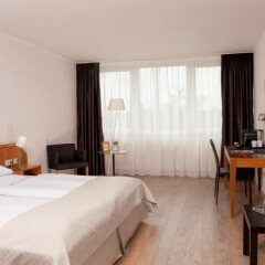 Отель Wyndham Hannover Atrium Германия, Ганновер - 1 отзыв об отеле, цены и фото номеров - забронировать отель Wyndham Hannover Atrium онлайн комната для гостей фото 4