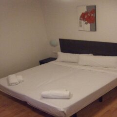 Апартаменты Km1 Atocha Apartments комната для гостей
