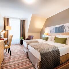 Leonardo Hotel Hamburg Stillhorn комната для гостей