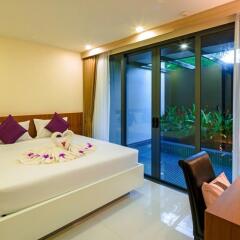 Отель At The Tree Condominium Phuket Вилла с различными типами кроватей