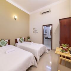Отель Green Garden Hoi An Villa Хойан сейф в номере