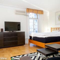 Отель ApartDirect Skeppsbron Швеция, Стокгольм - отзывы, цены и фото номеров - забронировать отель ApartDirect Skeppsbron онлайн комната для гостей фото 2