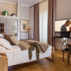 Апартаменты QT Suites & Apartments - Sistina комната для гостей
