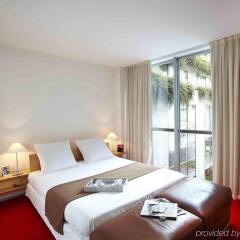 Отель La Clef Tour Eiffel (ex. Citadines Suites Arc de Triomphe) комната для гостей фото 3