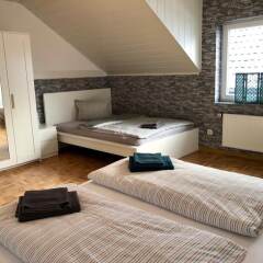 Отель Ferienwohnung Roemerhaus Xanten Германия, Ксантен - отзывы, цены и фото номеров - забронировать отель Ferienwohnung Roemerhaus Xanten онлайн комната для гостей