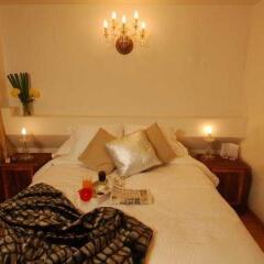 Aura Suites Boutique Hotel комната для гостей фото 4