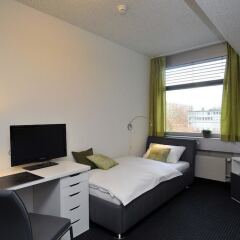 Отель Primestay Self Check-in Hotel Seebach Швейцария, Цюрих - отзывы, цены и фото номеров - забронировать отель Primestay Self Check-in Hotel Seebach онлайн комната для гостей фото 4
