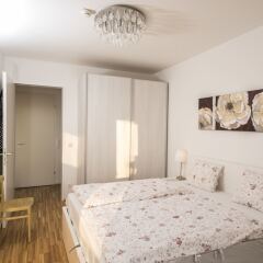 Отель Sky View Apartment Vienna by Welcome2Vienna Австрия, Вена - отзывы, цены и фото номеров - забронировать отель Sky View Apartment Vienna by Welcome2Vienna онлайн комната для гостей фото 2