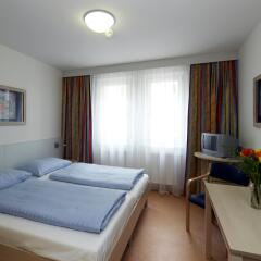 Отель Kolpinghaus Wien Zentral Австрия, Вена - - забронировать отель Kolpinghaus Wien Zentral, цены и фото номеров комната для гостей